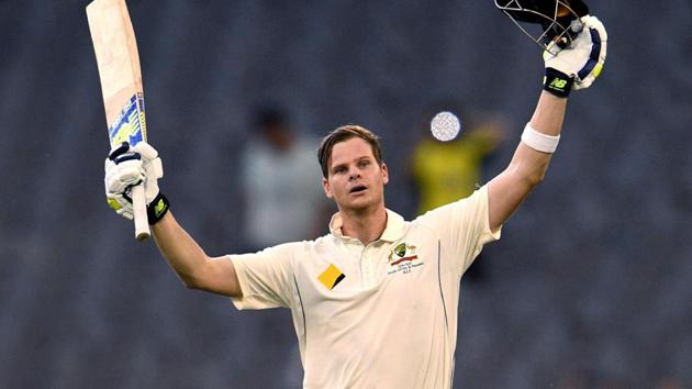 Australia's batsman Steve Smith celebrates after scoring his century against Pakistan in Melbourne.(AFP)