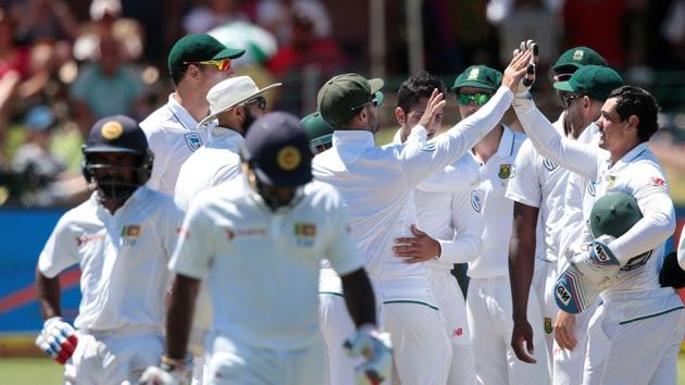 South African players celebrate the dismissal of Sri Lanka batsman Kusal Janith Perera (front) during the fourth day of the first Test in Port Elizabeth. (AFP) South African players celebrate the dismissal of Sri Lanka batsman Kusal Janith Perera (front) during the fourth day of the first Test in Port Elizabeth. (AFP)