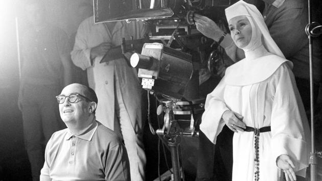 In this November 15, 1965, file photo, Debbie Reynolds, dressed as nun for her role as a singing nun in the MGM picture of that name, practices her next scene while she watches a scene being filmed. (AP FILE PHOTO) In this November 15, 1965, file photo, Debbie Reynolds, dressed as nun for her role as a singing nun in the MGM picture of that name, practices her next scene while she watches a scene being filmed. (AP FILE PHOTO)