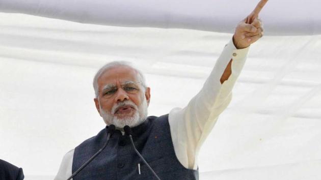 PM Narendra Modi's addresses a rally at Parade Ground in Dehradun, India, on Tuesday, Dec 27, 2016.(Vijnay Santosh Kumar/ HT File Photo)