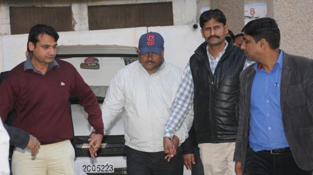 Yadav Singh (wearing blue cap) was the chief engineer of Noida, Greater Noida and Yamuna Expressway authorities. He is currently lodged in Dasna jail over corruption allegations. (HT File) Yadav Singh (wearing blue cap) was the chief engineer of Noida, Greater Noida and Yamuna Expressway authorities. He is currently lodged in Dasna jail over corruption allegations. (HT File)