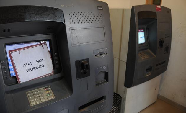 An ATM machine in Sector-14, Gurgaon, displaying a signboard saying ‘ATM not working’.(Parveen Kumar/HT Photo) An ATM machine in Sector-14, Gurgaon, displaying a signboard saying ‘ATM not working’.(Parveen Kumar/HT Photo)