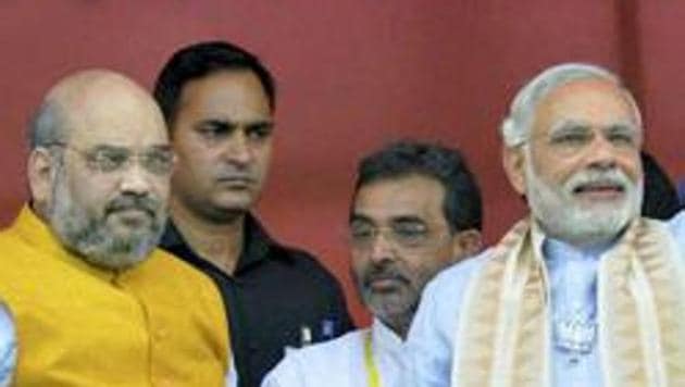 Prime Minister Narendra Modi with BJP president Amit Shah at a rally in Gaya, Bihar. The Congress has targeted the duo for being associated with a Gujarat banker who is under the scanner.(PTI File Photo) Prime Minister Narendra Modi with BJP president Amit Shah at a rally in Gaya, Bihar. The Congress has targeted the duo for being associated with a Gujarat banker who is under the scanner.(PTI File Photo)