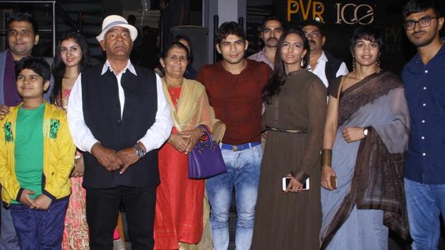 Wrestlers Mahavir Singh Phogat, Geeta Phogat and Babita Kumari along with their family during the screening of film Dangal in Mumbai on Dec 22, 2016.(IANS)