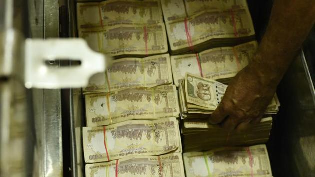 In a shock announcement on Nov 8, Prime Minister Narendra Modi said that Rs 500 and 1,000 banknotes were being withdrawn from circulation in a bid to crack down on corruption and counterfeit currency .(Vipin Kumar/HT Photo) In a shock announcement on Nov 8, Prime Minister Narendra Modi said that Rs 500 and 1,000 banknotes were being withdrawn from circulation in a bid to crack down on corruption and counterfeit currency .(Vipin Kumar/HT Photo)