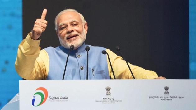 Prime Minister Narendra Modi at the launch of a new mobile app 'BHIM' to encourage e-transactions at Talkatora Stadium in New Delhi on Friday.(PTI)