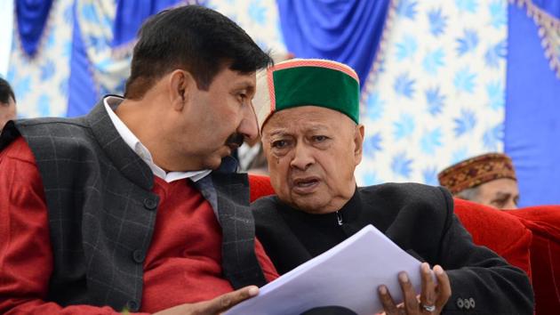 Chief Minister Virbhadra Singh and industries minister Mukesh Agnihotri during the pensioner’s day event in Shimla.(HT File Photo) Chief Minister Virbhadra Singh and industries minister Mukesh Agnihotri during the pensioner’s day event in Shimla.(HT File Photo)