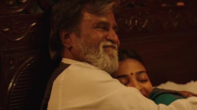 One of the scenes released show Kabali sharing a romantic moment with his wife, Kumudha played by Radhika Apte.(YouTube Grab)