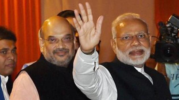Prime Minister Narendra Modi (right) with BJP president Amit Shah at the party headquarters in New Delhi in November 2016. (PTI File Photo) Prime Minister Narendra Modi (right) with BJP president Amit Shah at the party headquarters in New Delhi in November 2016. (PTI File Photo)