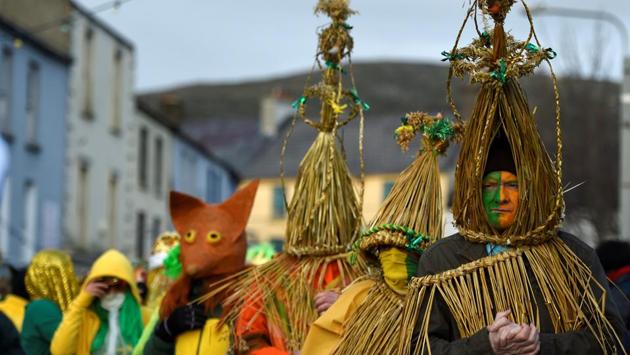Costumed participants are seen during an Irish tradition of Hunting of the Wren festival held every St. Stephen's Day in Dingle, Ireland on December 26, 2016. (Clodagh Kilcoyne / REUTERS)