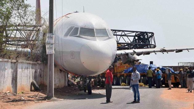 An Air India aircraft crashed near the Begumpet airport in Hyderabad while being transported by a crane for training on December 25, 2016. (PTI)