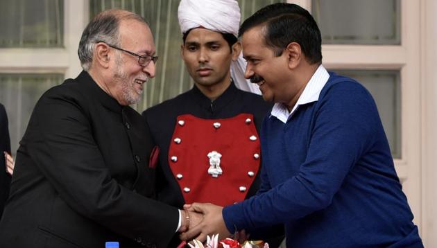 Delhi chief minister Arvind Kejriwal with Anil Baijal before Baijal’s swearing-in ceremony as the new lieutenant governor of Delhi on December 31, 2016. (Sushil Kumar/HT PHOTO)