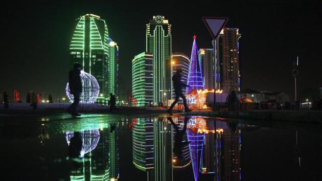 A Christmas tree and skyscrapers illuminated for the New Year celebrations are seen in downtown Grozny, the capital of Chechnya, Russia. (AP) A Christmas tree and skyscrapers illuminated for the New Year celebrations are seen in downtown Grozny, the capital of Chechnya, Russia. (AP)