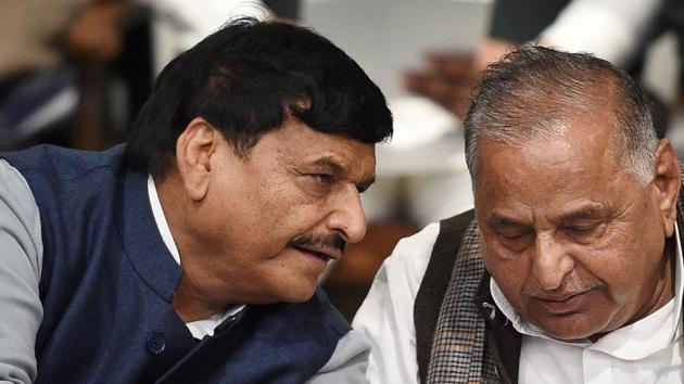 Lucknow: Samajwadi Party supremo Mulayam Singh Yadav with party's UP President Shivpal Yadav at a press conference at the party office in Lucknow on Wednesday. PTI Photo by Nand Kumar (PTI12_28_2016_000138A)(PTI) Lucknow: Samajwadi Party supremo Mulayam Singh Yadav with party's UP President Shivpal Yadav at a press conference at the party office in Lucknow on Wednesday. PTI Photo by Nand Kumar (PTI12_28_2016_000138A)(PTI)