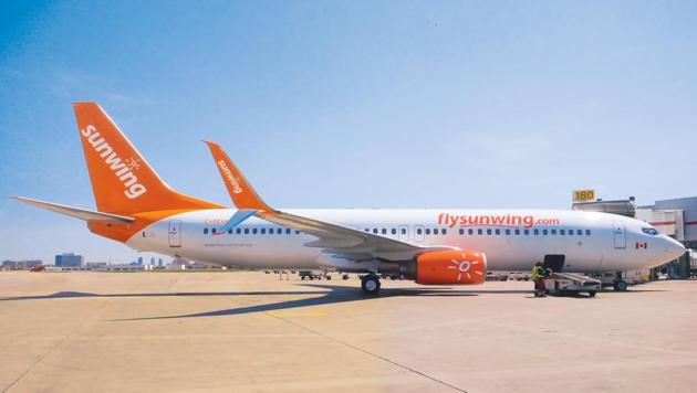 Police said the pilot boarded the Boeing 737 with 99 passengers and six crew members in Calgary, Alberta. (Mark King/Sunwing Airlines) Police said the pilot boarded the Boeing 737 with 99 passengers and six crew members in Calgary, Alberta. (Mark King/Sunwing Airlines)