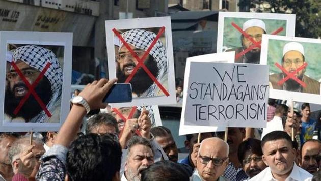 Activists protest against the chief of Jaish-e-Mohammad, Maulana Masood Azhar (left placard) and chief of Pakistan's outlawed Islamic hardline Jamaat ud Dawa (JD), Hafiz Mohammad Saeed (right placard) in Mumbai in January 2016 immediately after the attack on the Pathankot airbase. (AFP File) Activists protest against the chief of Jaish-e-Mohammad, Maulana Masood Azhar (left placard) and chief of Pakistan's outlawed Islamic hardline Jamaat ud Dawa (JD), Hafiz Mohammad Saeed (right placard) in Mumbai in January 2016 immediately after the attack on the Pathankot airbase. (AFP File)