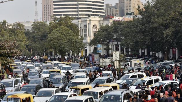 A choc-a-bloc inner circle of the Connaught Place on Sunday, the New Year’s Day. The traffic police carried out an intensive drive against traffic rule violators on December 31 night and various parts of CP were made vehicle-free zones. (Ravi Choudhary/HT Photo) A choc-a-bloc inner circle of the Connaught Place on Sunday, the New Year’s Day. The traffic police carried out an intensive drive against traffic rule violators on December 31 night and various parts of CP were made vehicle-free zones. (Ravi Choudhary/HT Photo)
