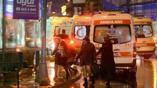 People run away from a nightclub where a gun attack took place during a New Year party in Istanbul. People run away from a nightclub where a gun attack took place during a New Year party in Istanbul.