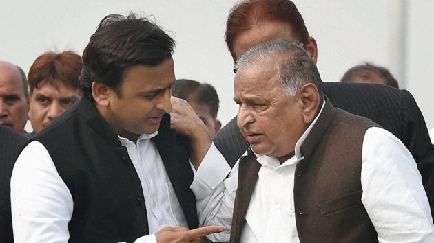SP supremo Mulayam Singh Yadav and UP chief minister Akhilesh Yadav during a function in Lucknow on December 1, 2016.(PTI File Photo)
