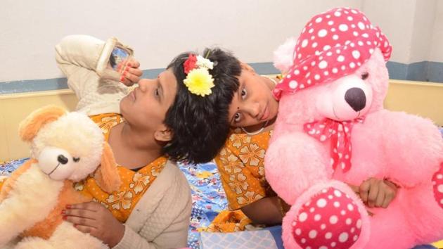 Vani and Veena were shifted from special care ward of Niloufer Hospital to a state home early on New Year’s Day.(HT Photo)