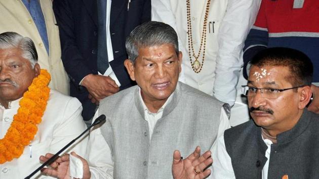 Chief minister Harish Rawat addresses a press conference in Dehradun on Monday with Congress state unit president Kishore Upadhyay (right). (PTI) Chief minister Harish Rawat addresses a press conference in Dehradun on Monday with Congress state unit president Kishore Upadhyay (right). (PTI)