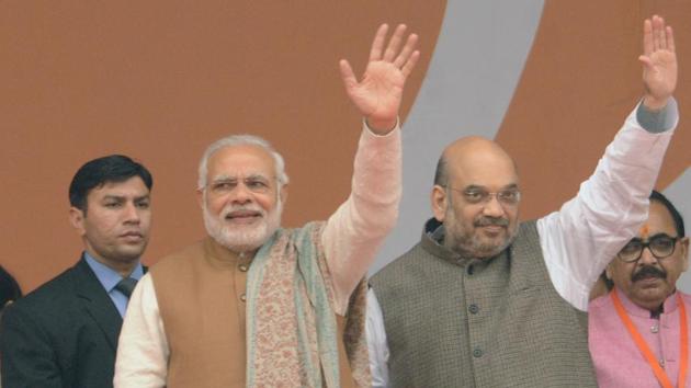 Prime Minister Narendra Modi and other senior BJP leaders wave to the crowd during Parivartan Rally at Ramabai Ambedkar grounds in Lucknow on Monday. (Ashok Dutta/HT Photo) Prime Minister Narendra Modi and other senior BJP leaders wave to the crowd during Parivartan Rally at Ramabai Ambedkar grounds in Lucknow on Monday. (Ashok Dutta/HT Photo)