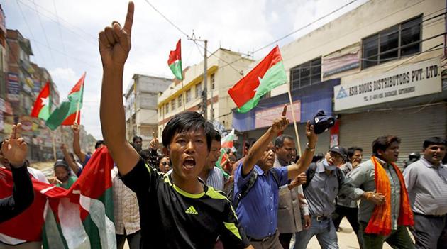 File photo of protesters marching on a road in Kathmandu during a strike organised by a 30-party alliance to protest against the draft of Nepal’s new Constitution. (Reuters) File photo of protesters marching on a road in Kathmandu during a strike organised by a 30-party alliance to protest against the draft of Nepal’s new Constitution. (Reuters)