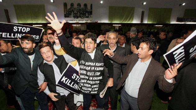 Opposition members protesting during the address of J-K Governor to the joint session of J-K Legislature on the first day of Budget Session in Jammu on Monday. (PTI Photo) Opposition members protesting during the address of J-K Governor to the joint session of J-K Legislature on the first day of Budget Session in Jammu on Monday. (PTI Photo)
