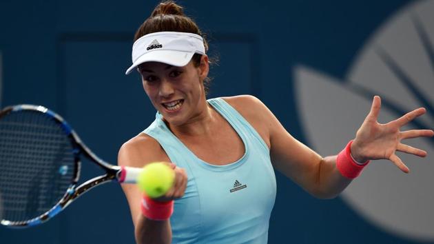 Garbine Muguruza of Spain hits a return against Samantha Stosur of Australia in the women's round one at the Brisbane International tennis tournament. (AFP) Garbine Muguruza of Spain hits a return against Samantha Stosur of Australia in the women's round one at the Brisbane International tennis tournament. (AFP)