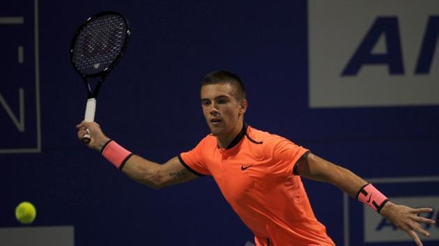 Borna Coric of Croatia plays a shot against Hyeon Chung of South Korea in first round match of the Chennai Open. (AFP) Borna Coric of Croatia plays a shot against Hyeon Chung of South Korea in first round match of the Chennai Open. (AFP)