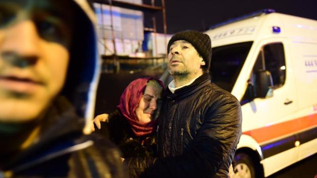 People react at the site of an armed attack January 1, 2017, in Istanbul (AFP) People react at the site of an armed attack January 1, 2017, in Istanbul (AFP)