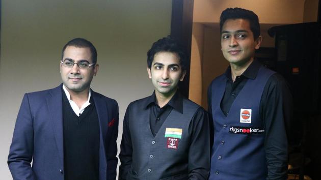 Sourav Kothari, Pankaj Advani and Aditya Mehta (from left) are taking part in an invitational snooker meet in Kolkata which ends on Sunday. (HT Photo) Sourav Kothari, Pankaj Advani and Aditya Mehta (from left) are taking part in an invitational snooker meet in Kolkata which ends on Sunday. (HT Photo)