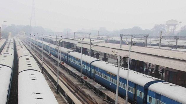 A train runs through fog on a cold morning,in Allahabad. (PTI)