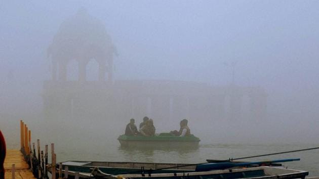 Jaisalmer: A view of a lake during a foggy morning in Jaisalmer, Rajasthan. (PTI)