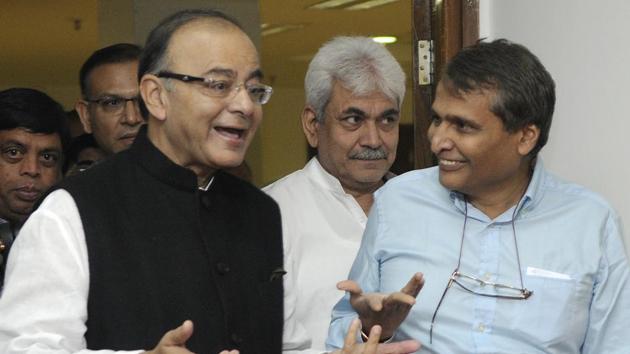 Minister of railways Suresh Prabhakar Prabhu talking with finance minister Arun Jaitley. The Union budget and the railway budget for the fiscal 2017-18 will be tabled in the Parliament together, breaking a century-old tradition.(HT file photo)