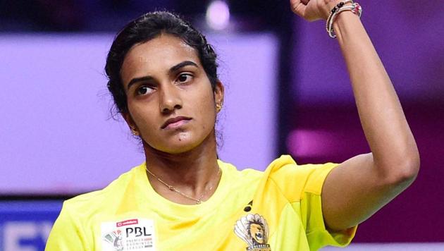 Chennai Smashers' PV Sindhu celebrates her win over Bengaluru Blasters player Cheung Ngan Yi during the women's singles of Premier Badminton League (PBL).