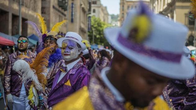 Hundreds of Cape Minstrels from different troops perform during the traditional Second New Year Parade. (Mujahid Safodien/AFP) Hundreds of Cape Minstrels from different troops perform during the traditional Second New Year Parade. (Mujahid Safodien/AFP)