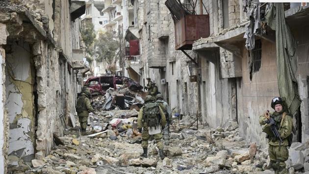 This undated handout photo released by the Russian Defense Ministry claims to show Russian Military engineers operating in Aleppo. (AP Photo) This undated handout photo released by the Russian Defense Ministry claims to show Russian Military engineers operating in Aleppo. (AP Photo)