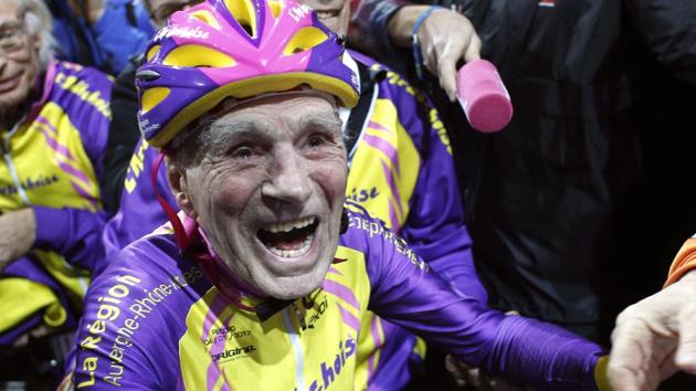 Robert Marchand, 105, reacts after setting a record for distance cycled in one hour, at the velodrome of Saint-Quentin en Yvelines, outside Paris, Wednesday. (Thibault Camus / AP Photo) Robert Marchand, 105, reacts after setting a record for distance cycled in one hour, at the velodrome of Saint-Quentin en Yvelines, outside Paris, Wednesday. (Thibault Camus / AP Photo)