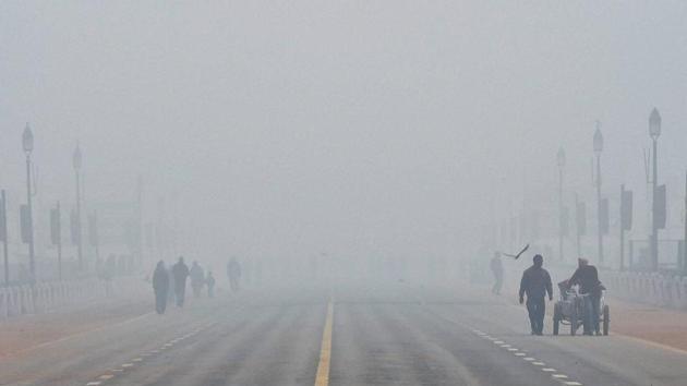 Fog envelops Rajpath in New Delhi. According to the weather office, the maximum temperature in Delhi is expected to remain unchanged for the next two days. The minimum temperature may rise by one degree on Friday. (PTI) Fog envelops Rajpath in New Delhi. According to the weather office, the maximum temperature in Delhi is expected to remain unchanged for the next two days. The minimum temperature may rise by one degree on Friday. (PTI)