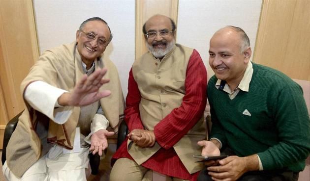 Delhi Finance Minister, Manish Sisodia with Finance Minister of Kerala, T M Thomas Isaac and West Bengal Finance Minister, Amit Mitra before the meeting of the GST Council at Vigyan Bhawan in New Delhi on Tuesday.(PTI)