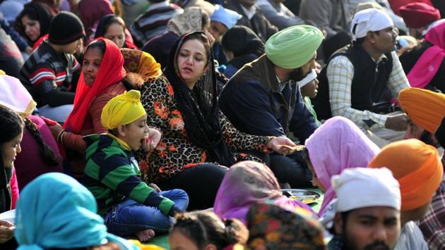 Devotees having langar in a gurdwara in Sector 34, Chandigarh on Thursday. (Ravi Kumar/HT Photo)