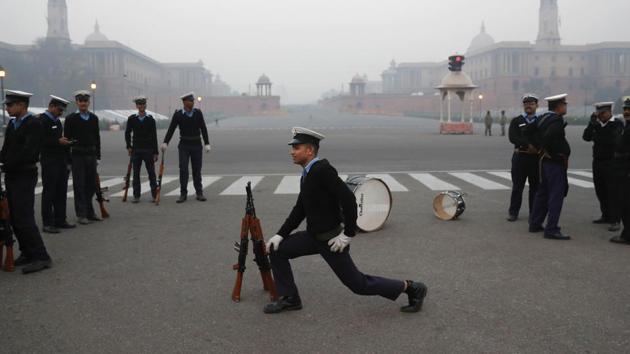 An Indian Coast Guard soldier stretches during a practice ahead of the Republic Day parade in New Delhi, India, Thursday, Jan. 5, 2017. Indians celebrate Republic Day on Jan. 26, marking the day that its constitution came into effect in 1950. (Tsering Topgyal / AP)