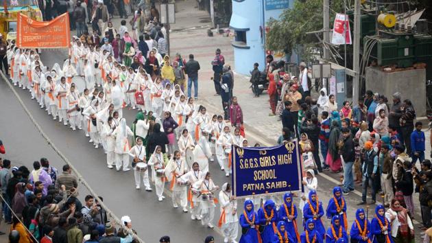 Sikh devotees participate in a Nagar Kirtan on Prakash Parva . (HT Photo) 