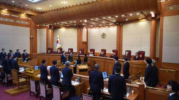 Judges of South Korea's Constitutional Court sit during a hearing on whether to confirm the impeachment of President Park Geun-Hye at the Court in Seoul on January 5, 2017. (AFP) Judges of South Korea's Constitutional Court sit during a hearing on whether to confirm the impeachment of President Park Geun-Hye at the Court in Seoul on January 5, 2017. (AFP)