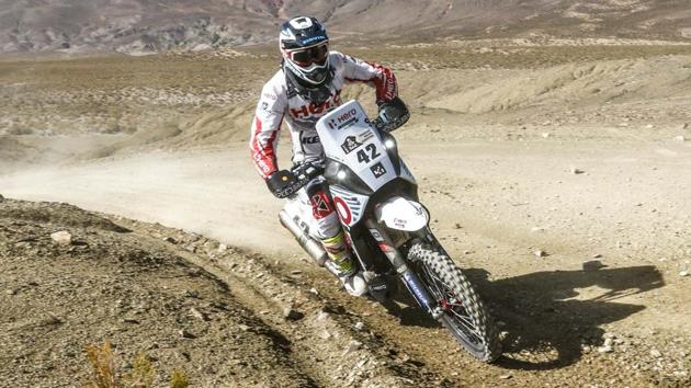 Indian rally rider CS Santosh during Stage 4 of the Dakar Rally. Santosh, who had to endure a one-hour time penalty for missing a waypoint in the third stage, and was relegated to 104th position in the starting order, held steady and gained 33 spots to finish 71st. (HT Photo) Indian rally rider CS Santosh during Stage 4 of the Dakar Rally. Santosh, who had to endure a one-hour time penalty for missing a waypoint in the third stage, and was relegated to 104th position in the starting order, held steady and gained 33 spots to finish 71st. (HT Photo)