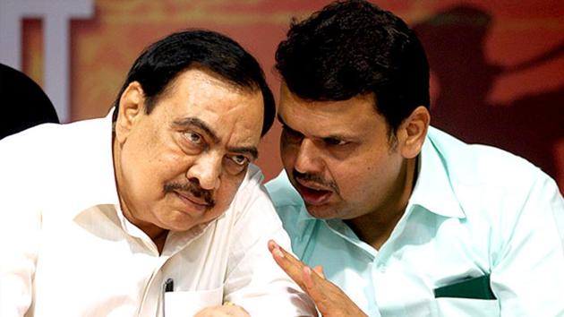 Eknath Khadse (R), a senior BJP leader and the then revenue minister in the Devendra Fadnavis government, had been facing a series of allegations including the irregularities in the land deal in Pune.(Kunal Patil/HT file photo) Eknath Khadse (R), a senior BJP leader and the then revenue minister in the Devendra Fadnavis government, had been facing a series of allegations including the irregularities in the land deal in Pune.(Kunal Patil/HT file photo)