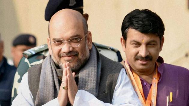 BJP president Amit Shah with Delhi BJP chief Manoj Tiwari at the party’s national executive meeting at NDMC Convention centre in Delhi. (PTI Photo) BJP president Amit Shah with Delhi BJP chief Manoj Tiwari at the party’s national executive meeting at NDMC Convention centre in Delhi. (PTI Photo)