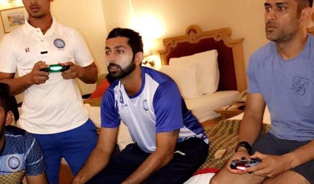 On January 4, the day the news came out about Mahendra Singh Dhoni’s retirement as Indian cricket team’s ODI and T20 captain, he was with his Jharkhand teammates, who were playing the Ranji Trophy semfinal against Gujarat in Nagpur. Captain Cool was so relaxed--he even played a round of video game with the juniors--that no one got any clue about the important decision. (HT Photo) On January 4, the day the news came out about Mahendra Singh Dhoni’s retirement as Indian cricket team’s ODI and T20 captain, he was with his Jharkhand teammates, who were playing the Ranji Trophy semfinal against Gujarat in Nagpur. Captain Cool was so relaxed--he even played a round of video game with the juniors--that no one got any clue about the important decision. (HT Photo)