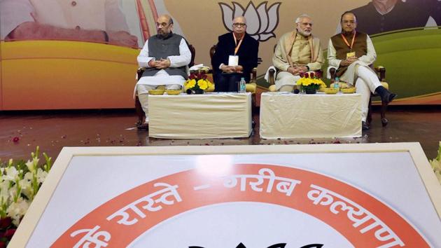 Prime Minister Narendra Modi wiith BJP President Amit Shah and senior party leader LK Advani and Arun Jaitley at the party's National Executive Meeting in New Delhi on Friday. (PTI Photo) Prime Minister Narendra Modi wiith BJP President Amit Shah and senior party leader LK Advani and Arun Jaitley at the party's National Executive Meeting in New Delhi on Friday. (PTI Photo)